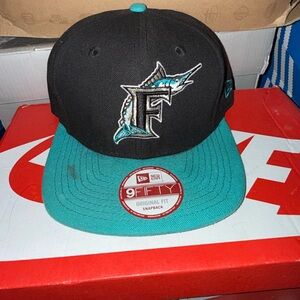 New Era Black and Teal Florida Marlins 9FIFTY Snapback Hat